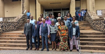 CAMAB Women members and officials on the steps of a public building after a meeting.