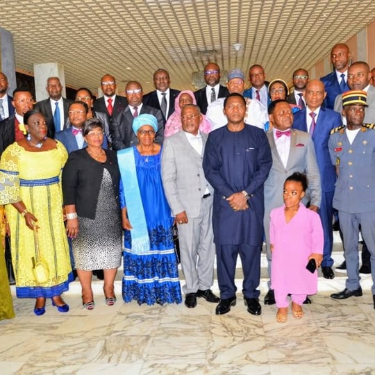 A formal group photograph of delegates at an electoral consultation in Cameroon.